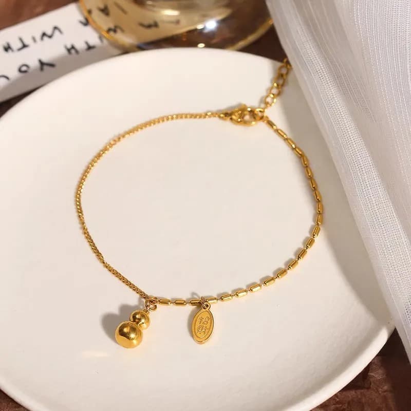 ゴールドアクセサリー 小粒ふたごの宝珠アンクレット
